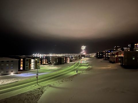 Fireworks Over Nuuk's Black Winter Sky