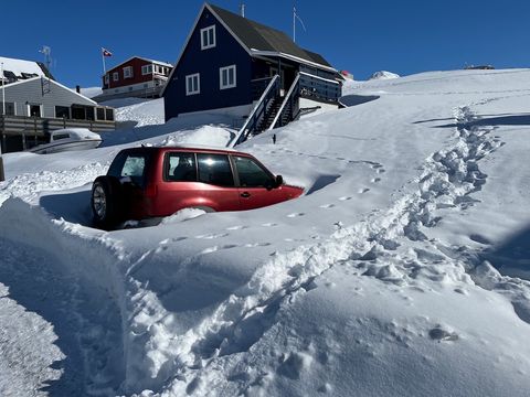 A Car Buried in a Snowdrift